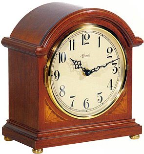 Hermle 22851-N92114 Chiming Klein Barrister Mantel Clock Hermle 22851-N92114 Westminster Chiming Quartz Mantel Clock Barrister mantel clock. This small barrister has an elegant cherry finish and wood corner fan inlays. Chiming German Westminster 4/4 and...