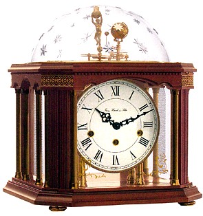Hermle Telumium III 22948-Q10352 Keywound Tellurium Clock The mechanical 8-day Westminster quarter hour bell chime movement with 11 jewel escapement and a automatic night shut-off activates the mechanism showing the movement of the sun, moon and earth in...