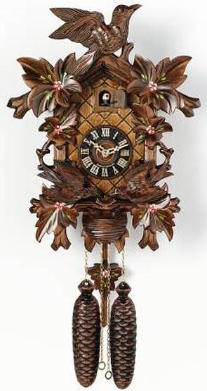 815-16p Moving Birds Over Nest Black Forest Cuckoo Clock Genuine Black Forest Cuckoo clock with two moving birds feeding over nest, colorful flowers and bird crown. Door opens where the Cuckoo bird will appear and 