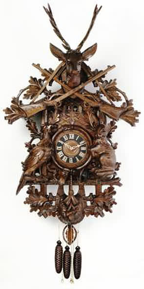 MD891-46 Hunters With Moving Animals Black Forest Musical Cuckoo Clock Genuine Black Forest Cuckoo clock with deer crown and animated animals. Door opens where the Cuckoo bird will appear and 